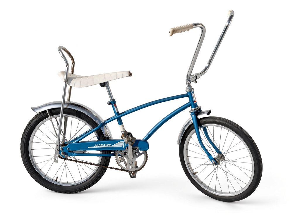 Blue 1970s Mohawk muscle bike with white banana seat and tall sissy bar